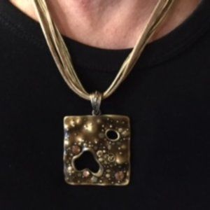 Beautiful Metal Necklace!  Looks great with sweaters or blouses.